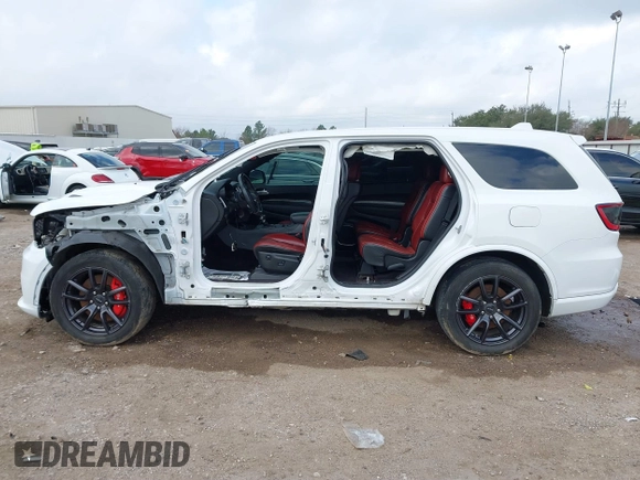 2018 Dodge Durango SRT with VIN 1C4SDJGJ4JC341550, listed as a IAAI auction lot 41525295 with 86,503 mi miles and . Bid and sale history available at DreamBid. Image 15.