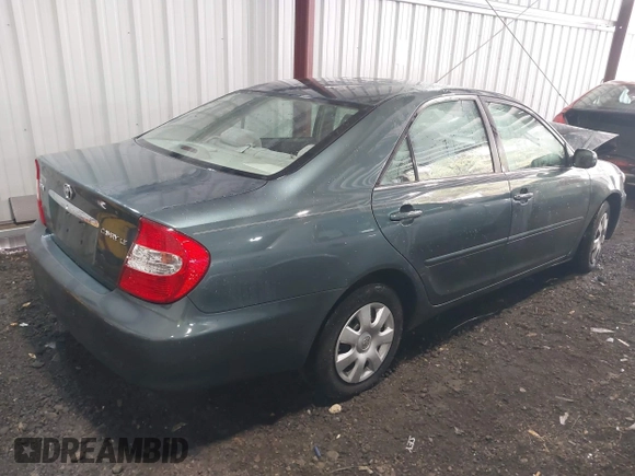 2004 Toyota Camry LE with VIN 4T1BE30K54U377818, listed as a IAAI auction lot 41931027 with 212,690 mi miles. Bid and sale history available at carsss.com. Image 4.