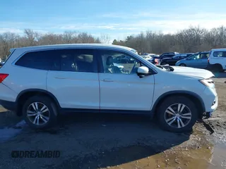 2017 Honda Pilot EX with VIN 5FNYF6H31HB051328, listed as a IAAI auction lot 41598959 with 37,799 mi miles and . Bid and sale history available at DreamBid. Image 12.
