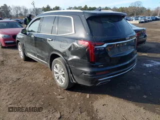 2023 Cadillac XT6 AWD Luxury с VIN 1GYKPBR41PZ136918, выставлен на аукционе IAAI как лот 41417724 с пробегом 57 949 миль миль и . История ставок и продаж доступна на DreamBid. Изображение 3.