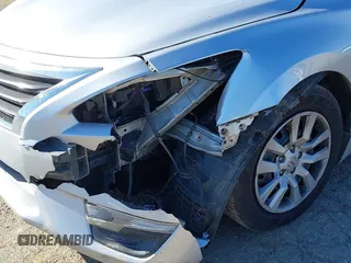 2014 Nissan Altima 2.5 S with VIN 1N4AL3AP3EC124848, listed as a IAAI auction lot 41406330 with 205,110 mi miles. Bid and sale history available at carsss.com. Image 6.