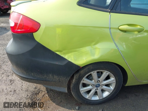 2011 Ford Fiesta SE z VIN 3FADP4BJ7BM122774, wystawiony jako IAAI lot #42392327 z przebiegiem 174 764 mil mil oraz . Historia ofert i sprzedaży dostępna na DreamBid. Obrazek 14.