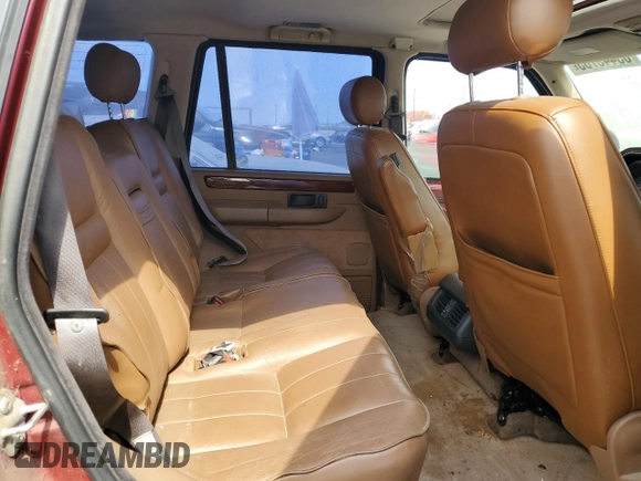 1996 Land Rover Range Rover z VIN SALPV144XTA333588, wystawiony jako Copart lot #65445765 z przebiegiem Nie podano mil oraz Czysty tytuł • Clean title. Historia ofert i sprzedaży dostępna na DreamBid. Obrazek 10.