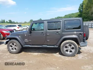 2016 Jeep Wrangler Unlimited Sahara with VIN 1C4BJWEG7GL340074, listed as a IAAI auction lot 42434763 with 81,095 mi miles and . Bid and sale history available at DreamBid. Image 14.