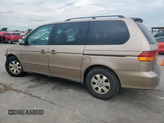 2004 Honda Odyssey EX-L with VIN 5FNRL18944B107051, listed as a Copart auction lot 58542335 with 207,951 mi miles and Salvage title. Bid and sale history available at DreamBid. Image 2.