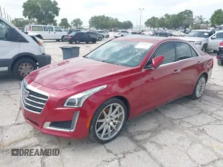 2015 Cadillac CTS Luxury AWD with VIN 1G6AX5SX2F0112852, listed as a IAAI auction lot 42398611 with 70,253 mi miles and . Bid and sale history available at DreamBid. Image 17.