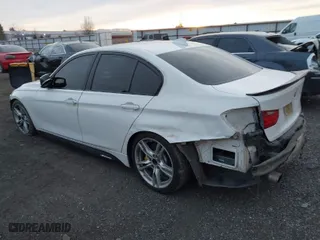 2014 BMW 3 Series 335i xDrive with VIN WBA3B9C56EF588393, listed as a IAAI auction lot 41383156 with 177,143 mi miles. Bid and sale history available at carsss.com. Image 3.