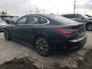 2022 BMW 4 Series 430i with VIN WBA63AV04NFM04338, listed as a Copart auction lot 71471224 with 63,671 mi miles and Salvage title. Bid and sale history available at DreamBid. Image 2.