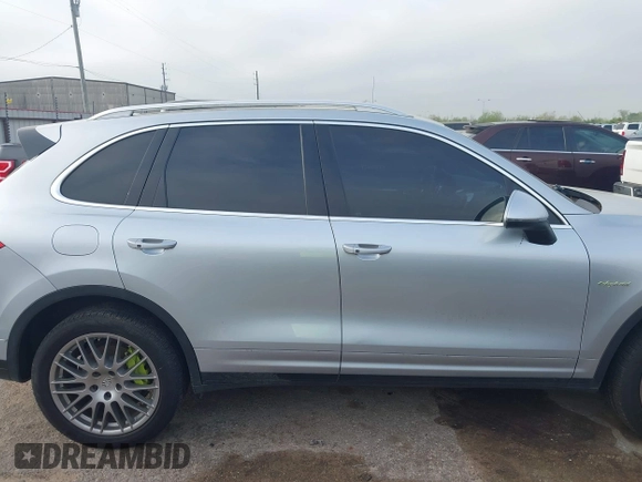 2016 Porsche Cayenne S E-Hybrid with VIN WP1AE2A26GLA59496, listed as a IAAI auction lot 41884022 with 85,386 mi miles and . Bid and sale history available at DreamBid. Image 13.