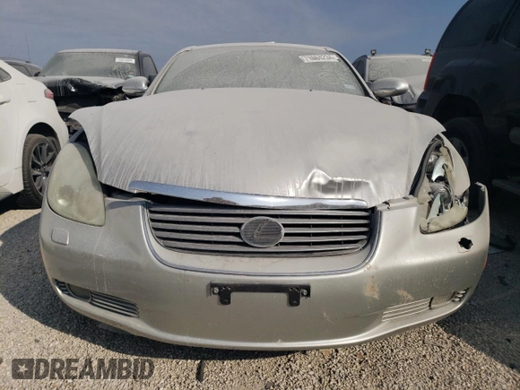2003 Lexus SC with VIN JTHFN48YX30040974, listed as a Copart auction lot 71664234 with 99,257 mi miles and Salvage Title. Bid and sale history available at carsss.com. Image 5.