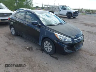 2016 Hyundai Accent SE z VIN KMHCT4AE5GU955767, wystawiony jako IAAI lot #42255231 z przebiegiem 112 594 mil mil oraz . Historia ofert i sprzedaży dostępna na DreamBid. Obrazek 1.