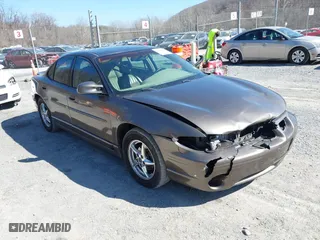 2003 Pontiac Grand Prix GT with VIN 1G2WP52KX3F123733, listed as a IAAI auction lot 41760217 with 165,815 mi miles. Bid and sale history available at carsss.com. Image 1.