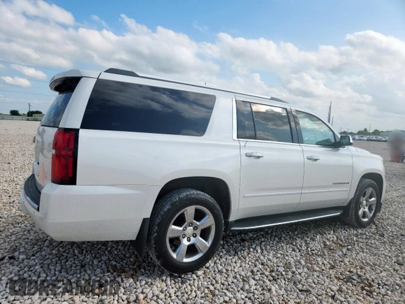 2017 Chevrolet Suburban Premier with VIN 1GNSCJKC1HR374998, listed as a Copart auction lot 60498905 with 240,652 mi miles and Salvage title. Bid and sale history available at DreamBid. Image 3.