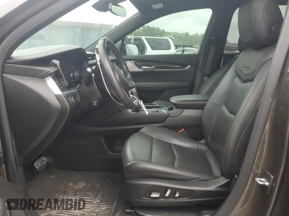 2020 Cadillac XT6 FWD Premium Luxury with VIN 1GYKPCRS4LZ133123, listed as a Copart auction lot 59411115 with 64,463 mi miles and Salvage title. Bid and sale history available at DreamBid. Image 7.