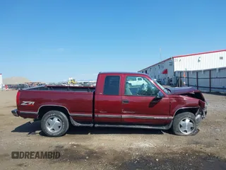 1998 Chevrolet Silverado 1500 with VIN 2GCEK19RXW1194136, listed as a IAAI auction lot 42111257 with 164,499 mi miles and . Bid and sale history available at DreamBid. Image 13.