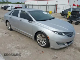 2013 Lincoln MKZ z VIN 3LN6L2G95DR828063, wystawiony jako IAAI lot #42398124 z przebiegiem 158 626 mil mil oraz . Historia ofert i sprzedaży dostępna na DreamBid. Obrazek 1.