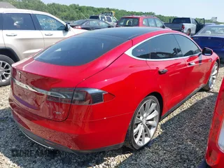 2013 Tesla Model S Performance with VIN 5YJSA1CP6DFP17689, listed as a IAAI auction lot 42483390 with 51,432 mi miles and . Bid and sale history available at DreamBid. Image 4.