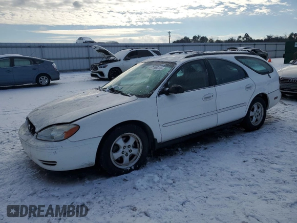 2005 Ford Taurus with VIN 1FAHP58255A219979, listed as a Copart auction lot 41699265 with 137,804 mi miles and Salvage title. Bid and sale history available at DreamBid. Image 1.