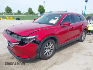 2016 Mazda CX-9 Touring with VIN JM3TCACY4G0112961, listed as a IAAI auction lot 42094718 with 114,679 mi miles and . Bid and sale history available at DreamBid. Image 18.