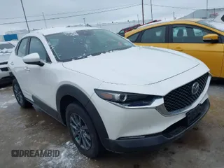 2023 Mazda CX-30 S with VIN 3MVDMBAM2PM572907, listed as a IAAI auction lot 41560059 with 16,084 mi miles and . Bid and sale history available at carsss.com. Image 1.