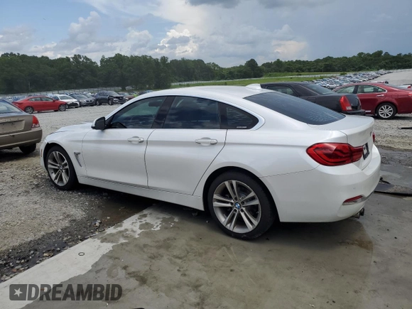 2018 BMW 4 Series 430i with VIN WBA4J1C54JBG79837, listed as a Copart auction lot 61041275 with 106,541 mi miles and Salvage title. Bid and sale history available at DreamBid. Image 2.