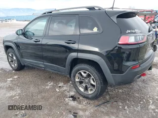 2019 Jeep Cherokee Trailhawk Elite with VIN 1C4PJMBX6KD313675, listed as a IAAI auction lot 41448924 with 51,639 mi miles. Bid and sale history available at carsss.com. Image 3.