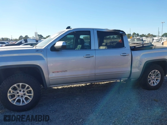 2017 GMC Sierra 1500 SLE with VIN 3GTU2MEC3HG199980, listed as a IAAI auction lot 40534708 with 129,765 mi miles and . Bid and sale history available at DreamBid. Image 14.