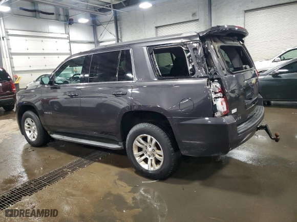 2015 Chevrolet Tahoe LT with VIN 1GNSKBKCXFR126500, listed as a Copart auction lot 49814255 with 106,714 mi miles and Salvage Title. Bid and sale history available at carsss.com. Image 2.