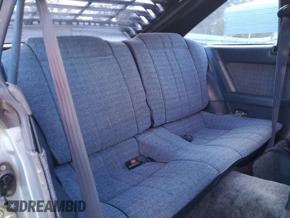 1983 Toyota Celica z VIN JT2RA64L7D6174381, wystawiony jako Copart lot #75986554 z przebiegiem 312 583 mil mil oraz Szkoda całkowita • Salvage title. Historia ofert i sprzedaży dostępna na DreamBid. Obrazek 10.