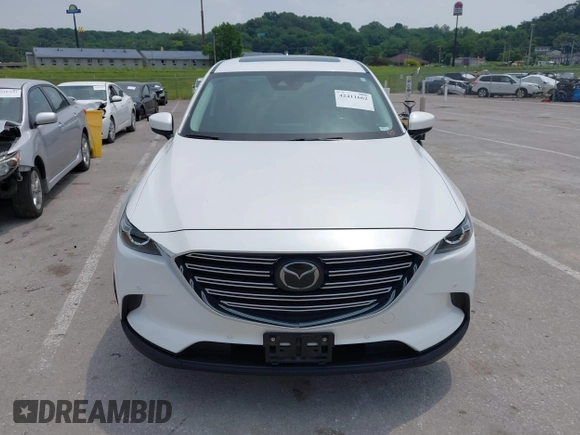 2019 Mazda CX-9 Touring with VIN JM3TCACY1K0334804, listed as a IAAI auction lot 42411662 with 49,447 mi miles and . Bid and sale history available at DreamBid. Image 12.
