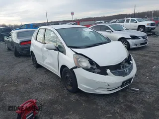 2013 Honda Fit with VIN JHMGE8H39DC005052, listed as a IAAI auction lot 41008236 with 124,874 mi miles. Bid and sale history available at carsss.com. Image 1.