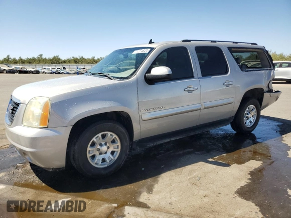 2007 GMC Yukon XL SLT with VIN 1GKFC16J47J244377, listed as a Copart auction lot 71274824 with 156,806 mi miles and Salvage Title. Bid and sale history available at carsss.com. Image 1.