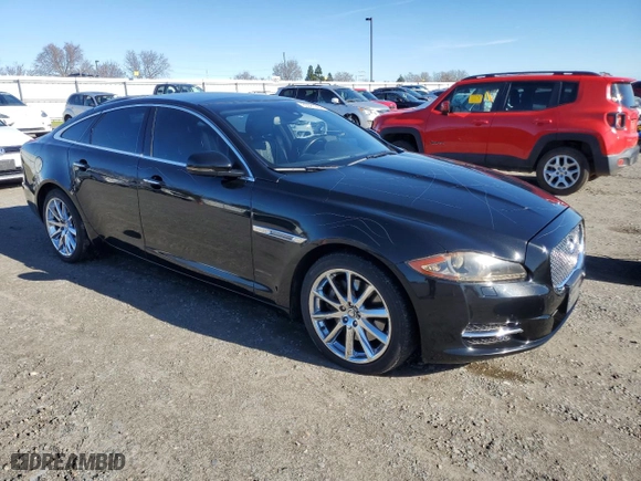 2011 Jaguar XJ with VIN SAJWA1CB2BLV06085, listed as a Copart auction lot 85981264 with NaN miles and Salvage Title. Bid and sale history available at carsss.com. Image 4.