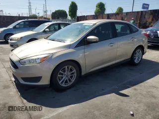 2017 Ford Focus SE with VIN 1FADP3F26HL211095, listed as a Copart auction lot 57509685 with 115,178 mi miles and Non repairable. Bid and sale history available at DreamBid. Image 1.