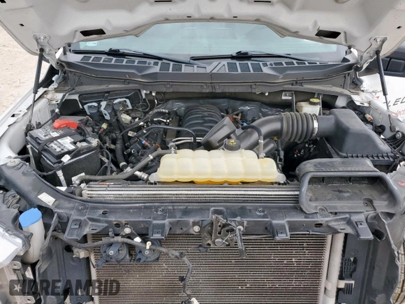 2022 Ford F-150 XL with VIN 1FTMF1C56NKD24644, listed as a Copart auction lot 63307315 with 64,704 mi miles and Salvage title. Bid and sale history available at DreamBid. Image 11.