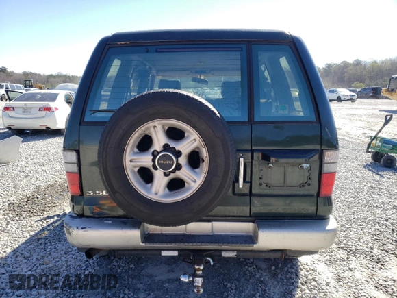 2002 Isuzu Trooper S с VIN JACDS58XX27J00836, выставлен на аукционе Copart как лот 48750285 с пробегом 221 177 миль миль и Списание • Salvage title. История ставок и продаж доступна на DreamBid. Изображение 6.
