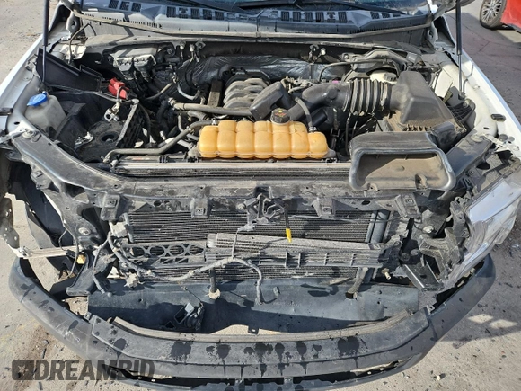 2015 Ford F-150 XLT with VIN 1FTFX1EFXFKD70393, listed as a Copart auction lot 51320365 with 173,741 mi miles and Salvage title. Bid and sale history available at DreamBid. Image 13.