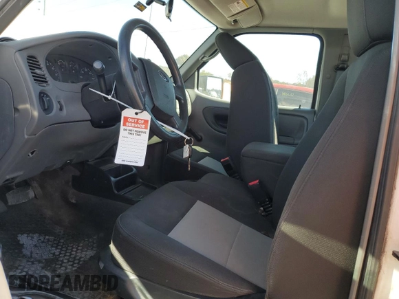 2011 Ford Ranger with VIN 1FTLR1EE0BPA14164, listed as a Copart auction lot 77312154 with 90,705 mi miles and Salvage Title. Bid and sale history available at DreamBid. Image 7.