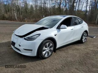 2022 Tesla Model Y Long Range z VIN 7SAYGDEE3NF418039, wystawiony jako Copart lot #78180804 z przebiegiem 36 269 mil mil oraz Szkoda całkowita • Salvage title. Historia ofert i sprzedaży dostępna na DreamBid. Obrazek 1.