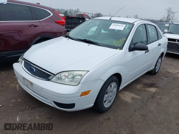 2007 Ford Focus S z VIN 1FAHP34N07W260725, wystawiony jako IAAI lot #42004694 z przebiegiem 84 923 mil mil oraz . Historia ofert i sprzedaży dostępna na DreamBid. Obrazek 17.