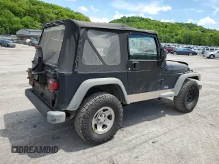 2004 Jeep Wrangler SE with VIN 1J4FA29124P796031, listed as a Copart auction lot 56875525 with 239,488 mi miles and Clean title. Bid and sale history available at DreamBid. Image 3.