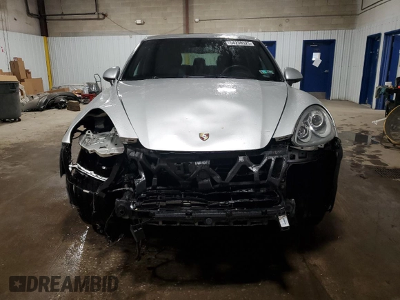 2014 Porsche Cayenne с VIN WP1AA2A21ELA00526, выставлен на аукционе Copart как лот 54238525 с пробегом 101 437 миль миль и Списание • Salvage title. История ставок и продаж доступна на DreamBid. Изображение 5.