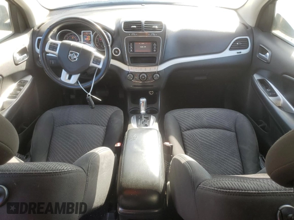 2016 Dodge Journey SE with VIN 3C4PDCABXGT103296, listed as a Copart auction lot 56358715 with 106,821 mi miles and Clean Title. Bid and sale history available at DreamBid. Image 8.