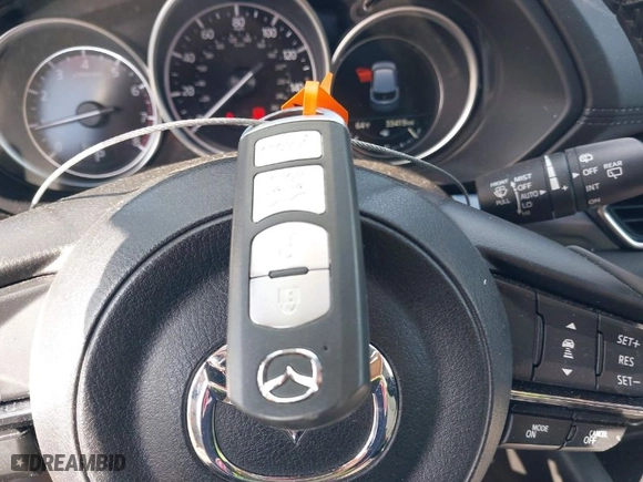 2019 Mazda CX-5 Touring with VIN JM3KFBCMXK1658009, listed as a IAAI auction lot 42028300 with 33,419 mi miles. Bid and sale history available at carsss.com. Image 11.