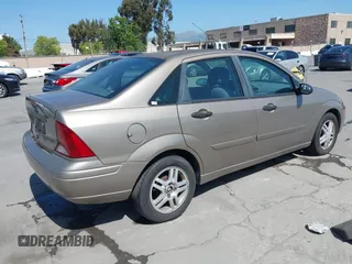 2004 Ford Focus SE with VIN 1FAFP34354W103841, listed as a IAAI auction lot 42099046 with 112,231 mi miles and . Bid and sale history available at DreamBid. Image 4.