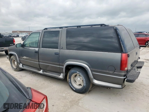 1999 Chevrolet Suburban with VIN 1GBEC16R0XJ434453, listed as a Copart auction lot 54711725 with 179,597 mi miles and Clean title. Bid and sale history available at DreamBid. Image 2.
