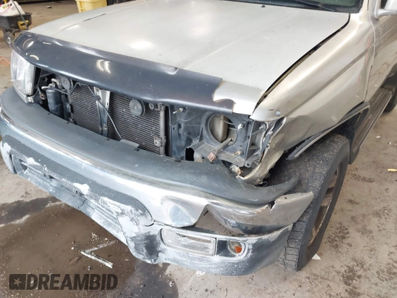 1999 Toyota 4Runner SR5 z VIN JT3HN86R8X0221532, wystawiony jako IAAI lot #41902556 z przebiegiem 406 602 mil mil oraz . Historia ofert i sprzedaży dostępna na DreamBid. Obrazek 6.