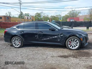 2021 Cadillac CT5 Luxury z VIN 1G6DX5RKXM0146235, wystawiony jako IAAI lot #42214676 z przebiegiem 72 847 mil mil oraz . Historia ofert i sprzedaży dostępna na DreamBid. Obrazek 13.