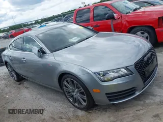 2014 Audi A7 Premium Plus with VIN WAUWGAFC5EN106514, listed as a IAAI auction lot 42182577 with 102,781 mi miles and . Bid and sale history available at DreamBid. Image 1.