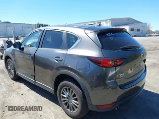 2017 Mazda CX-5 Touring with VIN JM3KFBCL2H0203497, listed as a IAAI auction lot 41860782 with 65,482 mi miles. Bid and sale history available at carsss.com. Image 3.